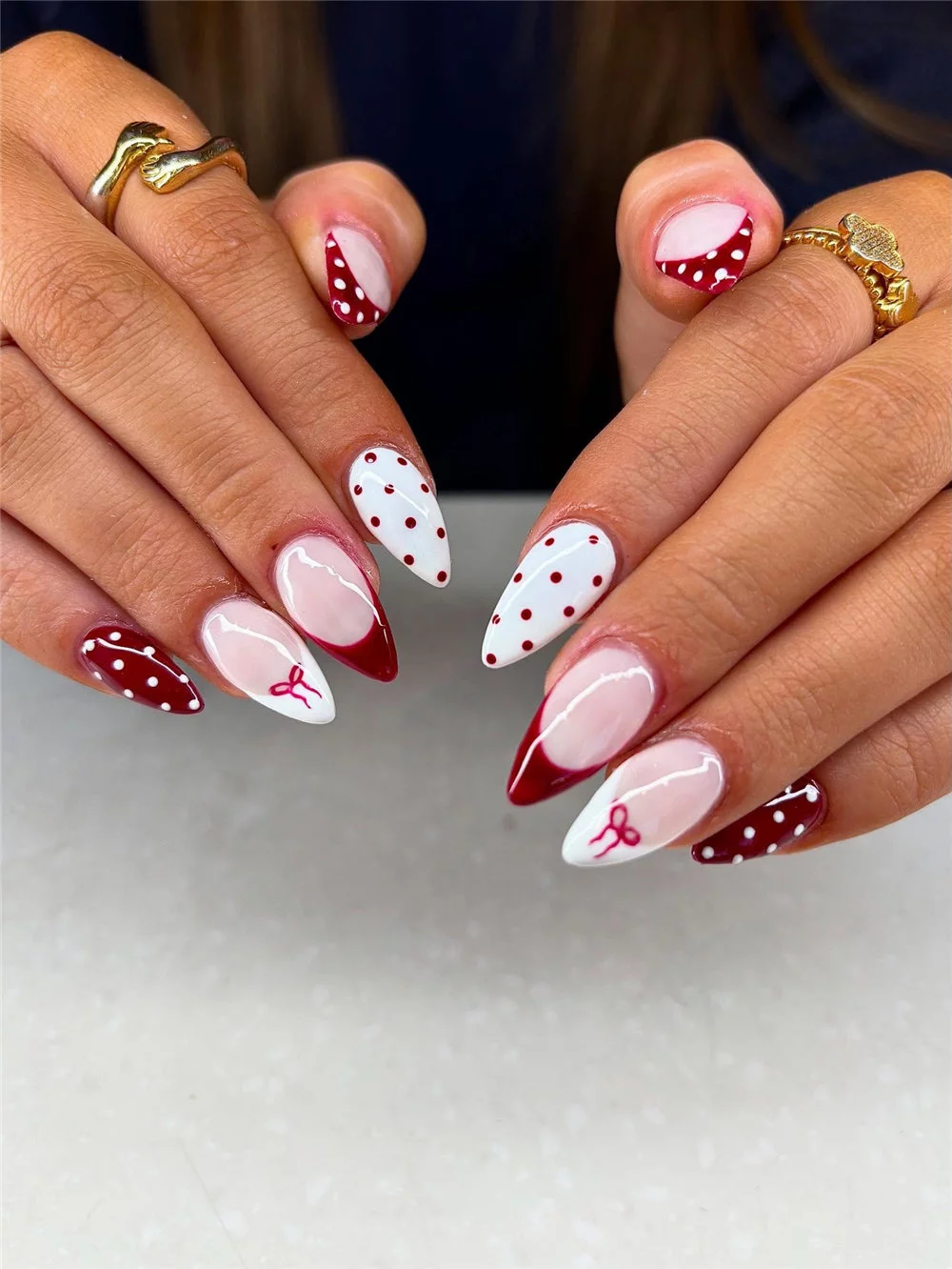 Elevate your holiday look with these 16 cute bow nails for Christmas! This year, cute bow nails are taking over the holiday trends, becoming the must-have look for winter. #ChristmasNails #BowNails #HolidayManicure #WinterNails
