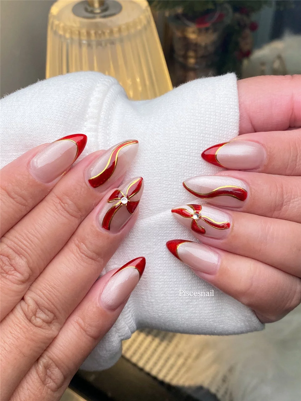 Elevate your holiday look with these 16 cute bow nails for Christmas! This year, cute bow nails are taking over the holiday trends, becoming the must-have look for winter. #ChristmasNails #BowNails #HolidayManicure #WinterNails