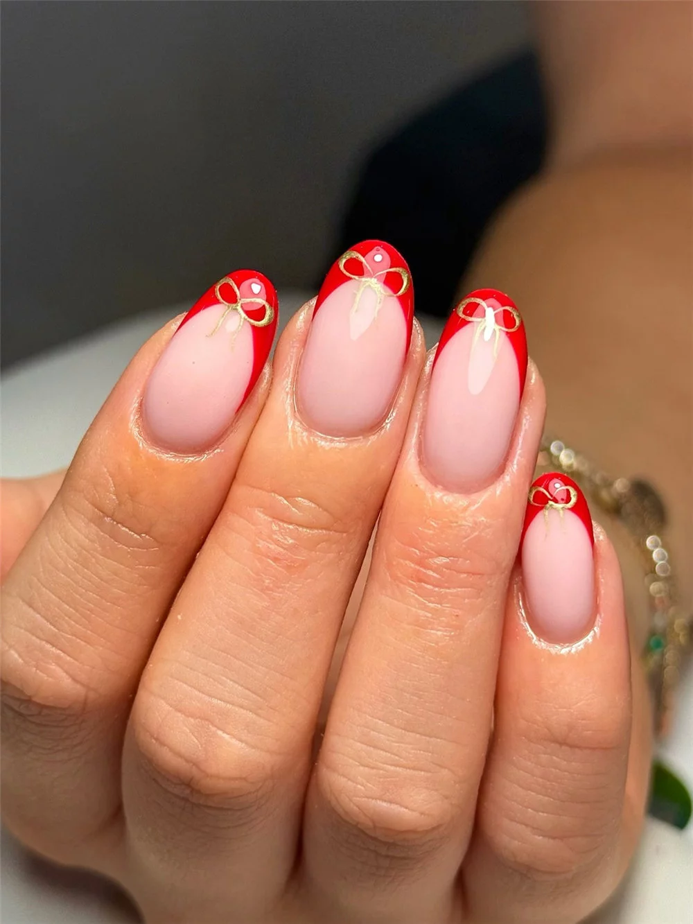 Elevate your holiday look with these 16 cute bow nails for Christmas! This year, cute bow nails are taking over the holiday trends, becoming the must-have look for winter. #ChristmasNails #BowNails #HolidayManicure #WinterNails