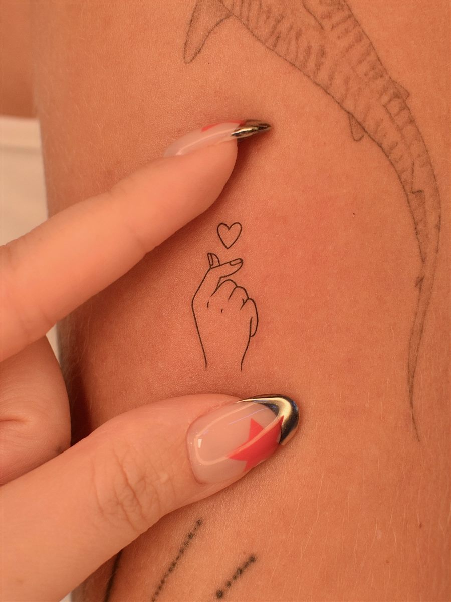 tiny heart hand tattoo idea for summer 2026