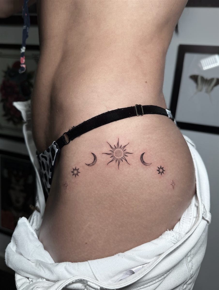 sun and moon hip tattoo idea for summer