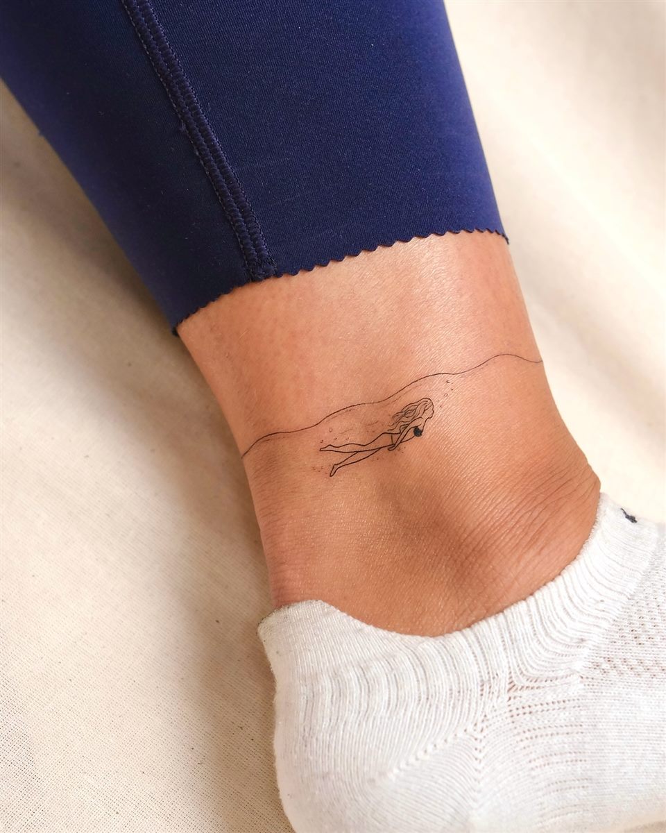 tiny ankle quote tattoo for women