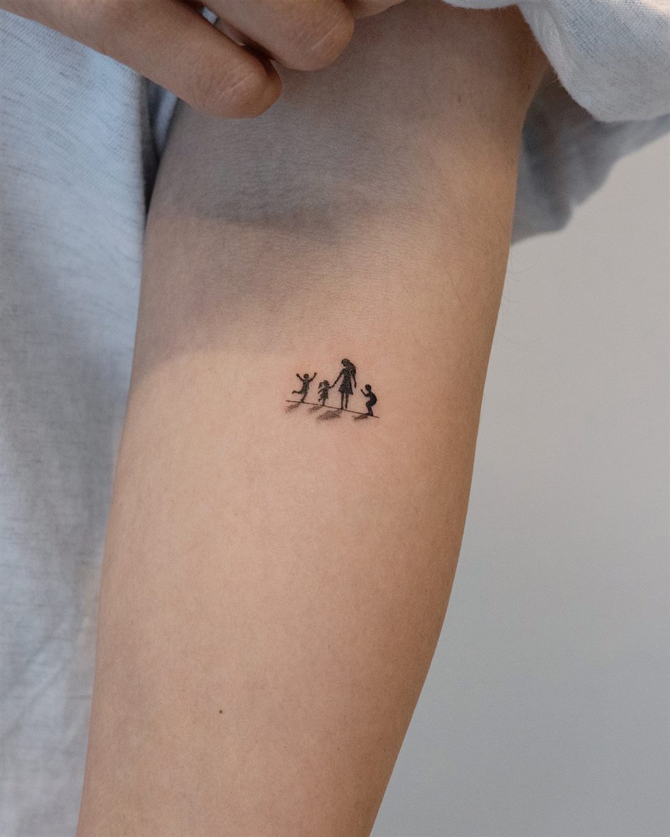 tiny matching symbol tattoo idea for women