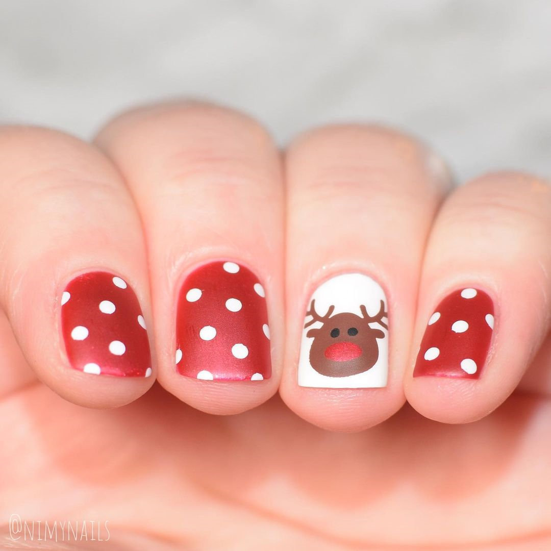 red and white nails christmas, winter nails 2021 trends, cute candy cane nails idea; santa nails design, reindeer nail designs #nailsdesign #christmasnails #nails #holidaynails #winternails