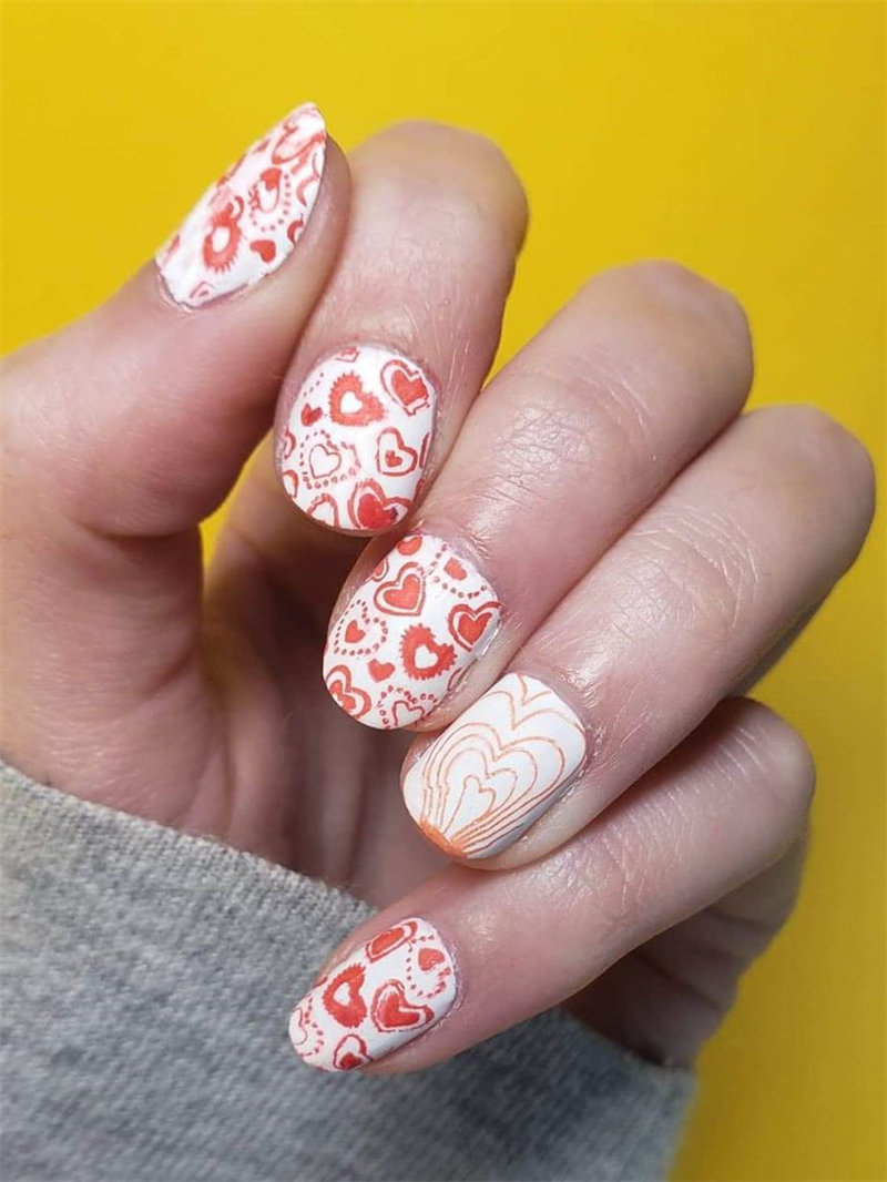 60 pink, red, and white valentine’s day nail ideas. We have gathered the best Valentines nails for you to find your Valentine's Day nail art inspiration. Click to see more nail art ideas. #NailArt #ValentineNails